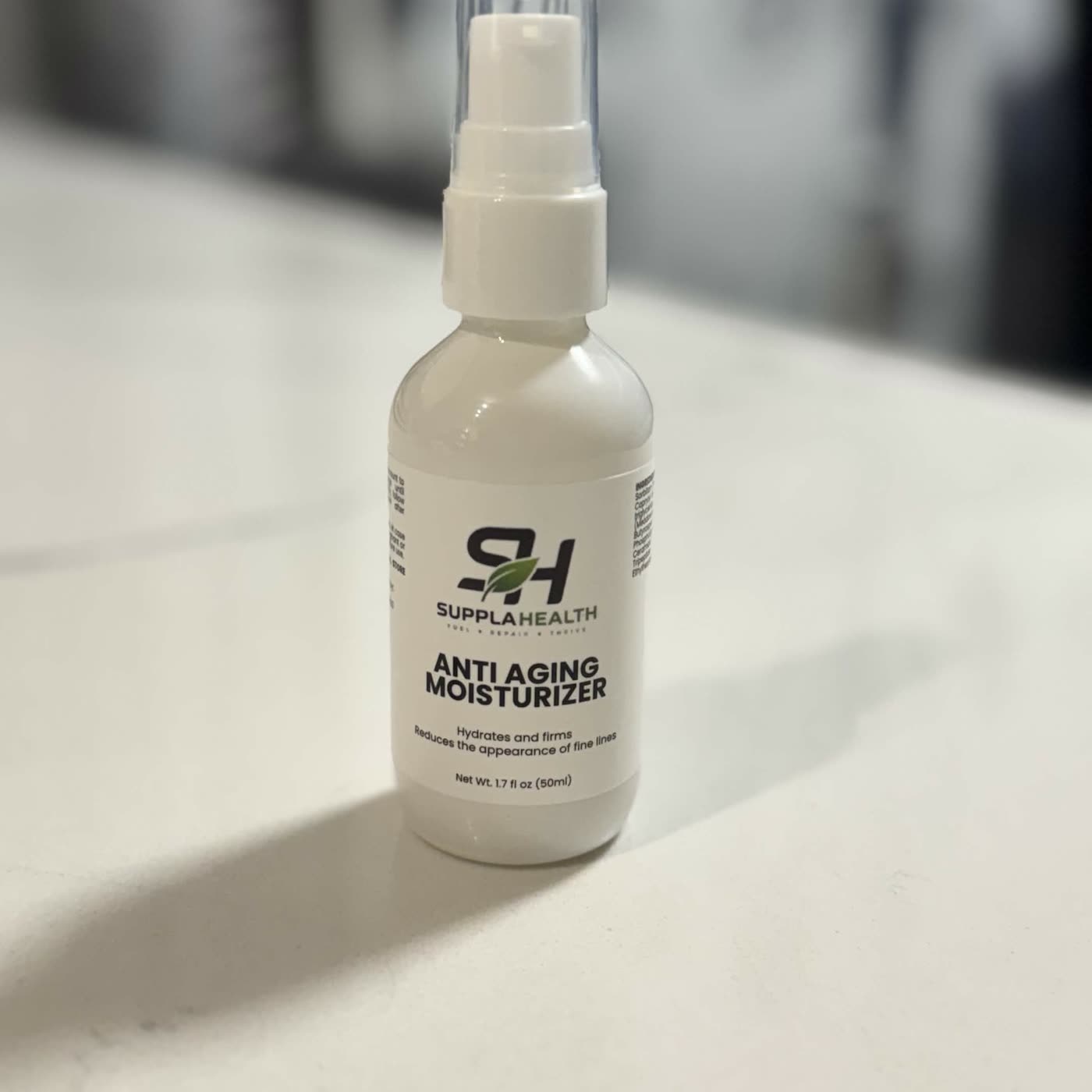 The SupplaHealth Anti Aging Moisturizer bottle, photographed